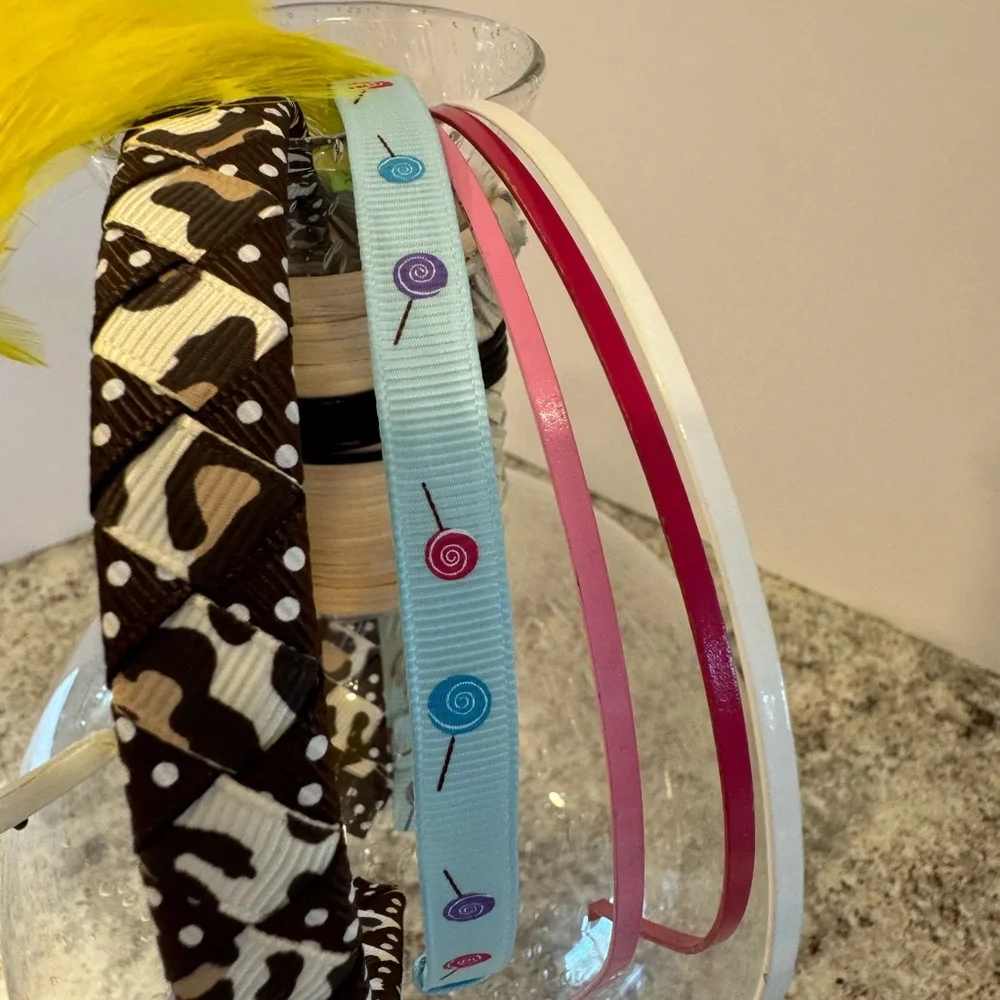 Headbands for girlsLot of 8. 5 are handmade with decorative ribbons. 3 are plain